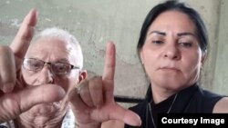 Madre (Ailex Marcano) y padre del prisionero político del 11J, Angel Jesús Veliz Marcano.