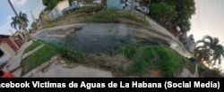 Salidero aguas albañales en calle Atlanta, Arroyo Naranjo.