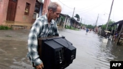 El Instituto de Meteorología de Cuba (Insmet) emitió una alerta ante la posible llegada de una onda tropical / Imagen de archivo durante las inundaciones ocasionadas por el huracán "Irene" (1999)