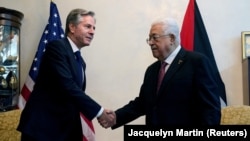 Secretario de Estado de EEUU, Antony Blinken, se reúne con el presidente palestino, Mahmoud Abbas, en Ammán, Jordania, 13 de octubre de 2023.