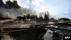 Vista del área destruida por el incendio de los tanques de petróleo en Matanzas. (Photo by YAMIL LAGE/AFP).