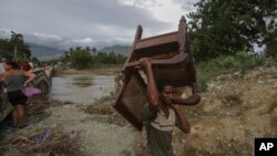 El huracán Oscar causó destrucción en las provincias orientales. (Foto AP/Ariel Ley, Pool)