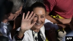 Claudia Sheinbaum arriba al centro de votación, en San Andrés Totoltepec, Tlalpan, en la Ciudad de México, este domingo, 2 de junio de 2024. (Yuri Cortez/AFP)