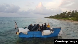 Migrantes cubanos en Islas Cayman Foto de la página del gobierno de Islas Cayman