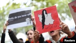 Manifestaciones en contra de la muerte de Mahsa Amini. Esta protesta fue en Berlín, el 24 de septiembre de 2022. (Reuters/Annegret Hilse).