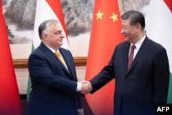 El primer ministro húngaro, Viktor Orbán se reúne con el presidente chino, Xi Jinping.