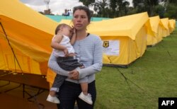 Migrantes venezolanos en un campo para refugiados en Bogotá, Colombia.