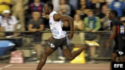 Fotografía de archivo del jamaicano Usain Bolt (i). EFE/YORICK