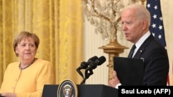 El presidente Joe Biden en la Casa Blanca con la canciller alemana Angela Merkel, el 15 de julio de 2021. (Saul Loeb/AFP).