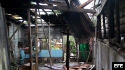 Aspecto de una vivienda afectada por el paso del huracán Sandy. 