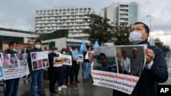 Una protesta de la comunidad uigur en Turquía contra las acciones represivas de China. (AP/Mehmet Guzel).