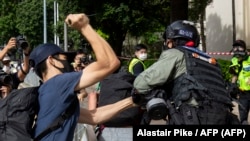 Manifestantes protestan en Hong Kong contra la nueva ley de seguridad nacional el 1 de julio de 2020. (Alastair Pike / AFP).